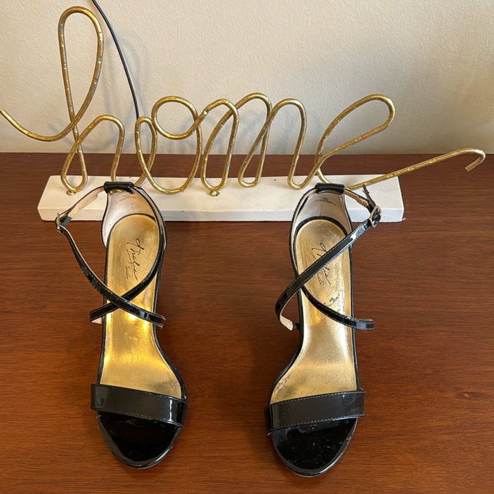 Size 7 black patent leather high heels